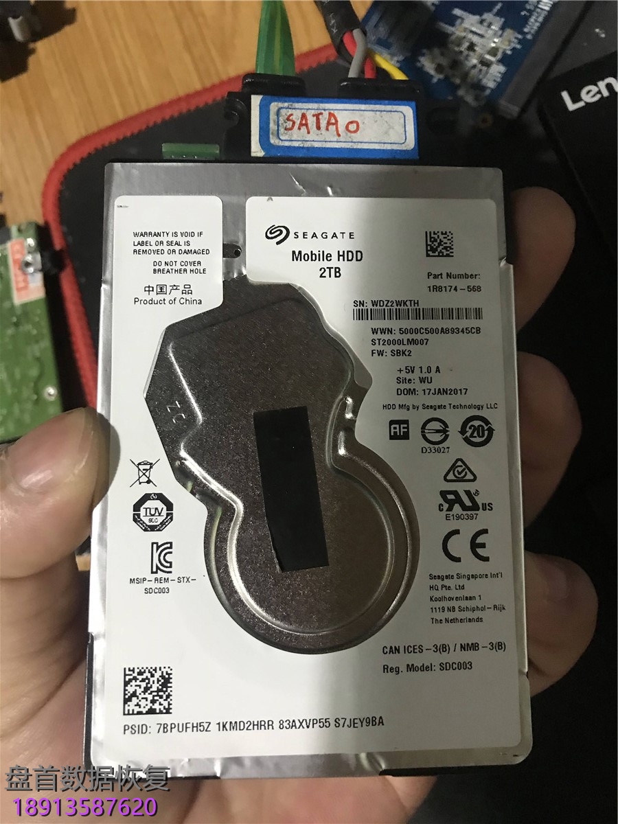 ST2000LM007希捷移动硬盘通电异响敲盘磁头损坏开盘数据恢复成功