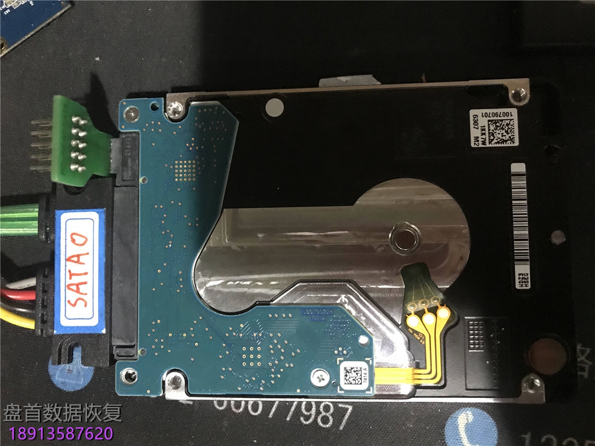ST2000LM007希捷移动硬盘通电异响敲盘磁头损坏开盘数据恢复成功