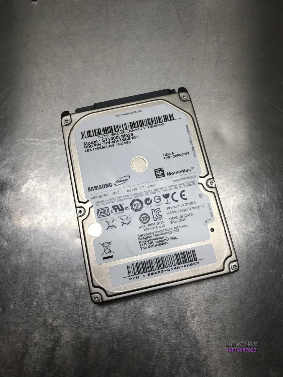 希捷1TB移动硬盘磁头卡死导致电机无法启动ST1000LM024开盘数据恢复成功