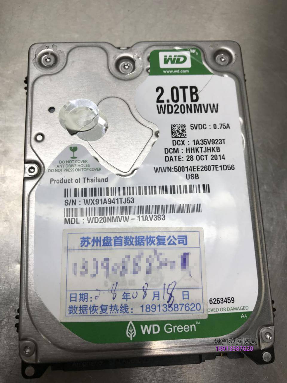 西数My passport 2TB移动硬盘WD20NMVW-11AV3S3原生USB接口磁头损坏变形划伤盘片!总共报废损坏了5块同型号的配件硬盘才把数据恢复成功。 西数My passport 2TB移动硬盘WD20NMVW-11AV3S3磁头损坏划伤盘片数据恢复成功