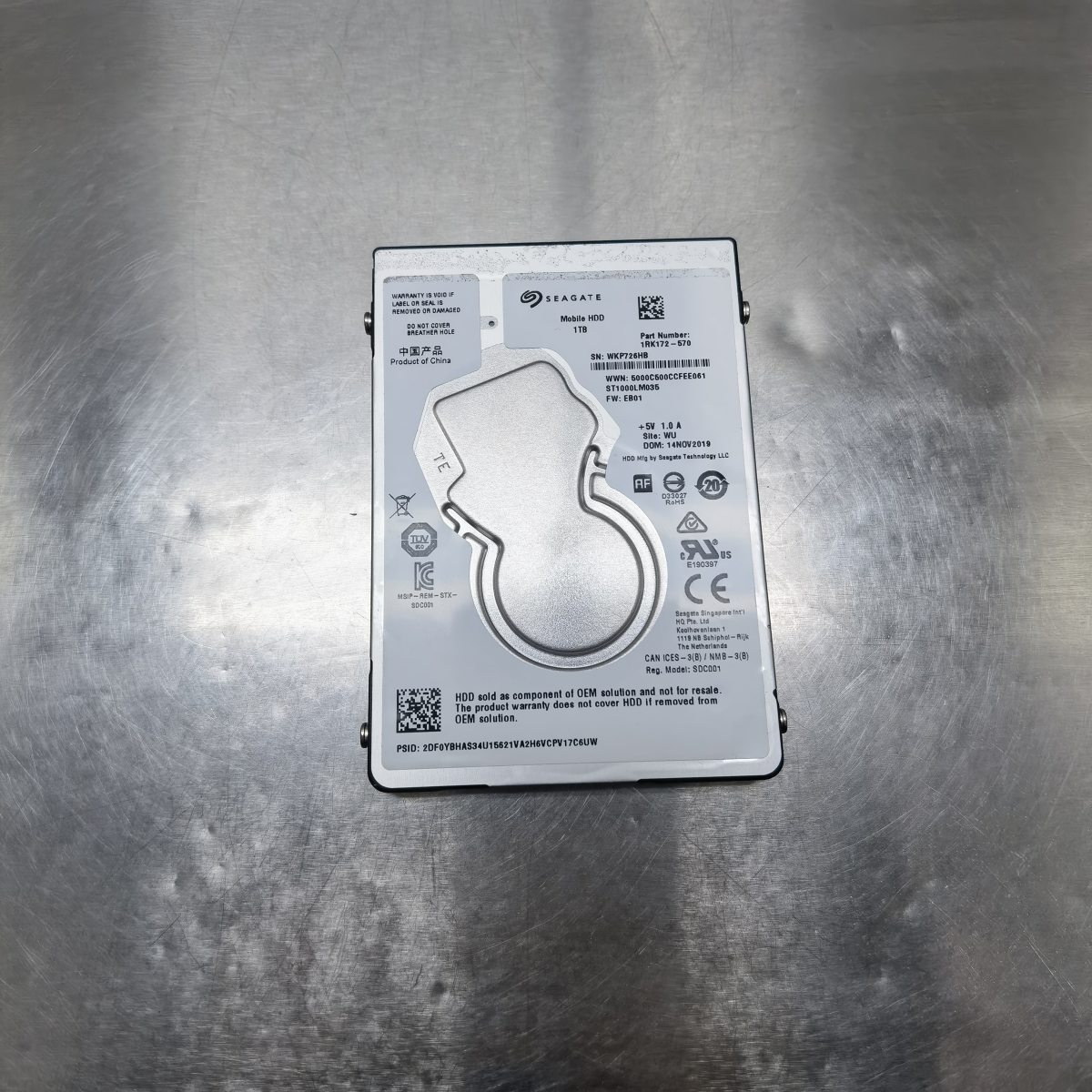 希捷1TB移动硬盘ST1000LM035型号识别正常无法识别容量如何修复并恢复数据?